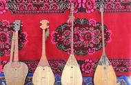 冬不拉是维吾尔族的乐器吗（哈萨克族乐器冬不拉的传说）